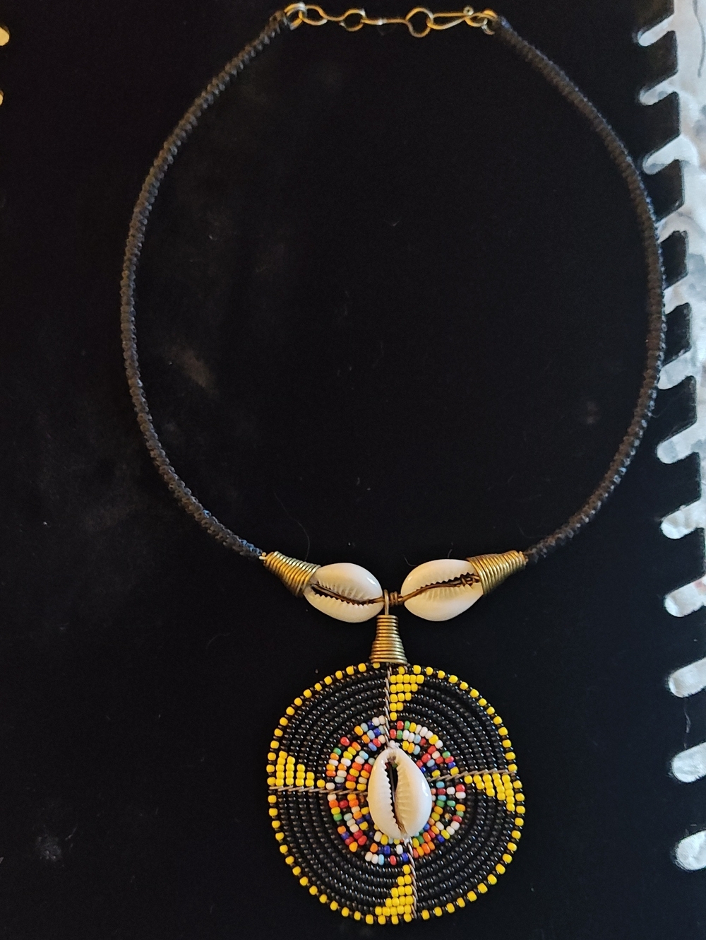 African Handcrafted Black and Yellow Beaded Shell Pendant Necklace